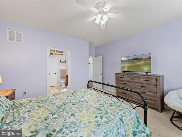 bedroom with light colored carpet and ceiling fan