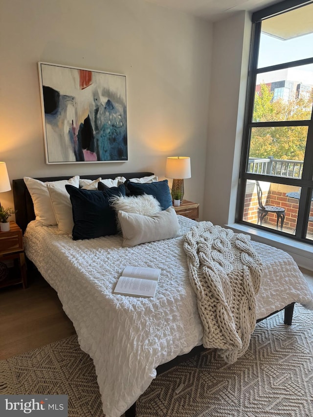 bedroom featuring hardwood / wood-style flooring