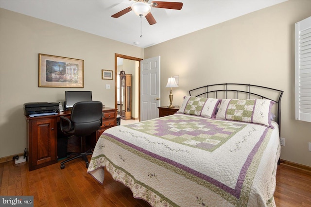 bedroom featuring ceiling fan and hardwood / wood-style flooring