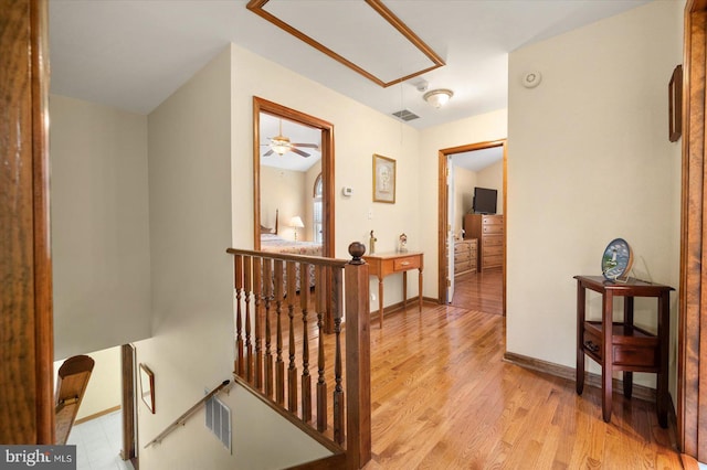 corridor featuring light hardwood / wood-style flooring