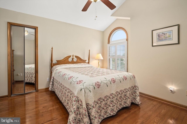 bedroom featuring ceiling fan, hardwood / wood-style flooring, a closet, and vaulted ceiling