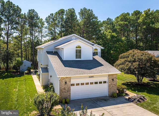 front facade with a front yard and a garage