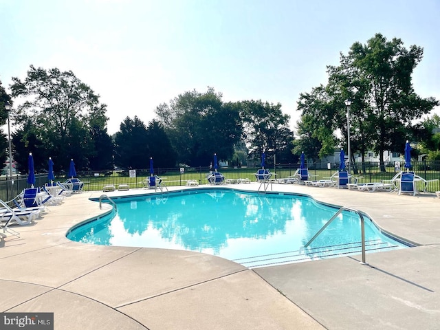 view of pool with a patio