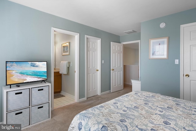 bedroom featuring light carpet