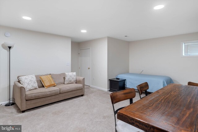 living room featuring light colored carpet