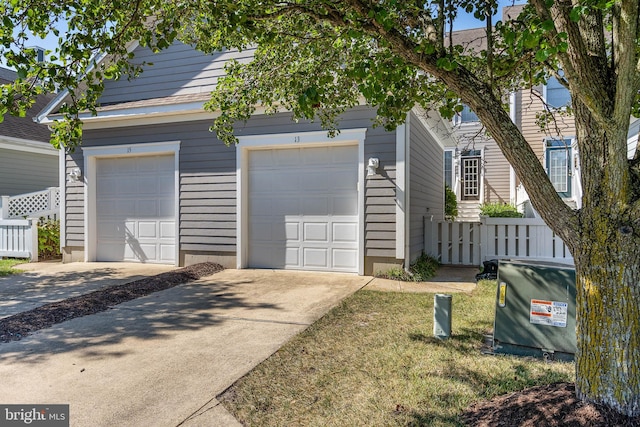 exterior space with a garage