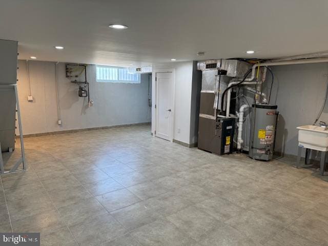 basement with gas water heater and heating unit