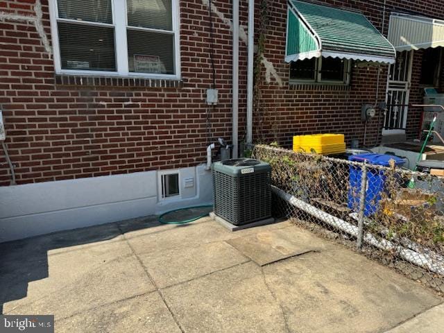 view of patio with central air condition unit