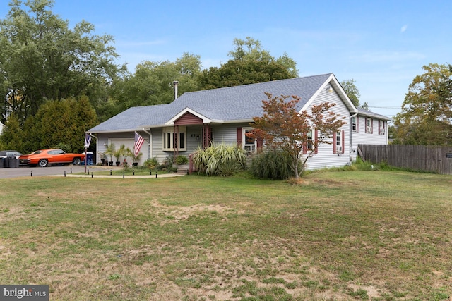 view of front facade with a front lawn