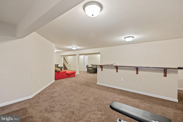 recreation room with light carpet