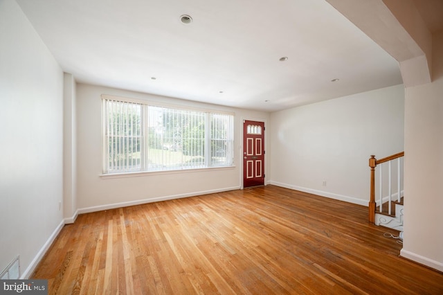 unfurnished room featuring light hardwood / wood-style flooring