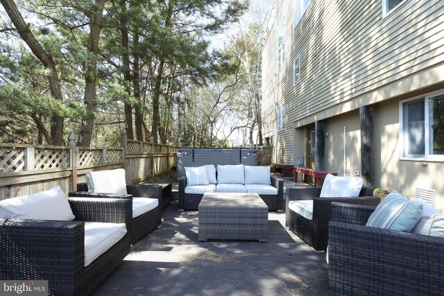 wooden deck featuring an outdoor hangout area