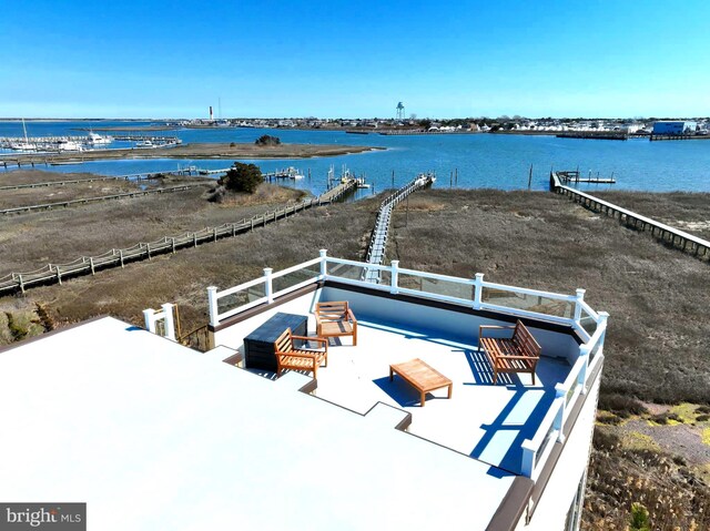 bird's eye view with a water view