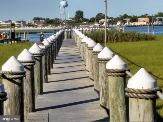 dock area featuring a water view