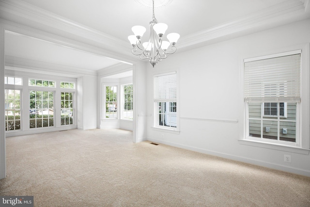 interior space with crown molding, light colored carpet, and a notable chandelier