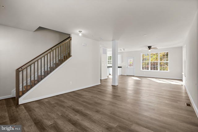 unfurnished living room with ceiling fan and hardwood / wood-style floors