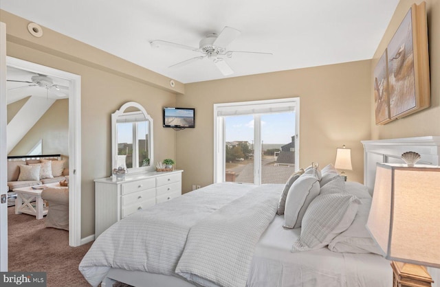 carpeted bedroom featuring multiple windows and ceiling fan