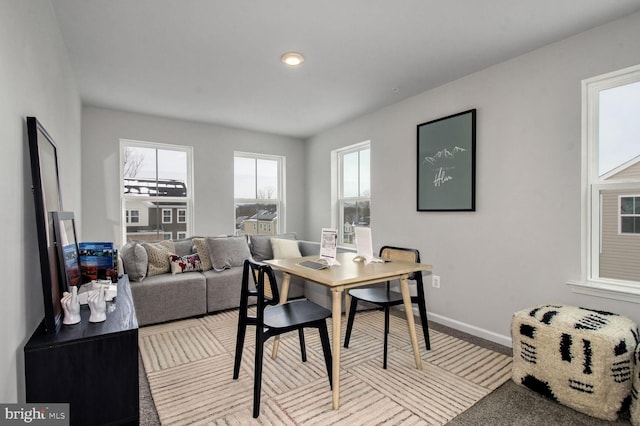 dining room featuring baseboards