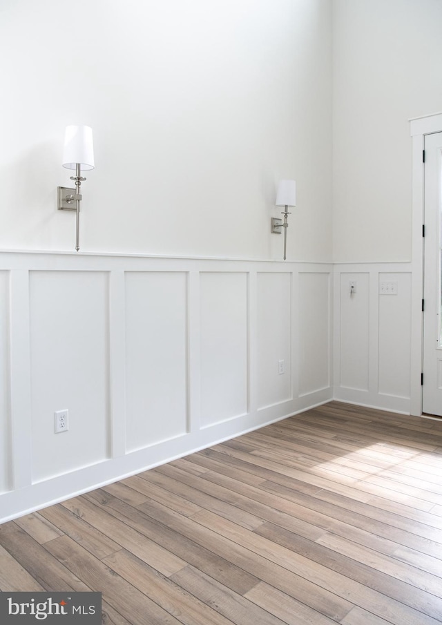 spare room with light wood-type flooring