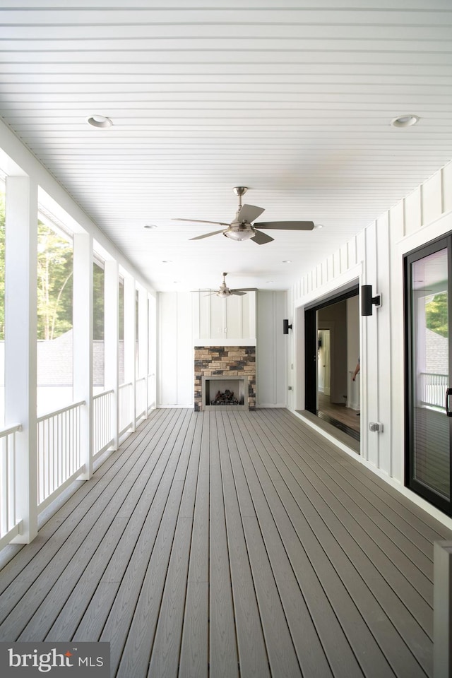 wooden deck with ceiling fan