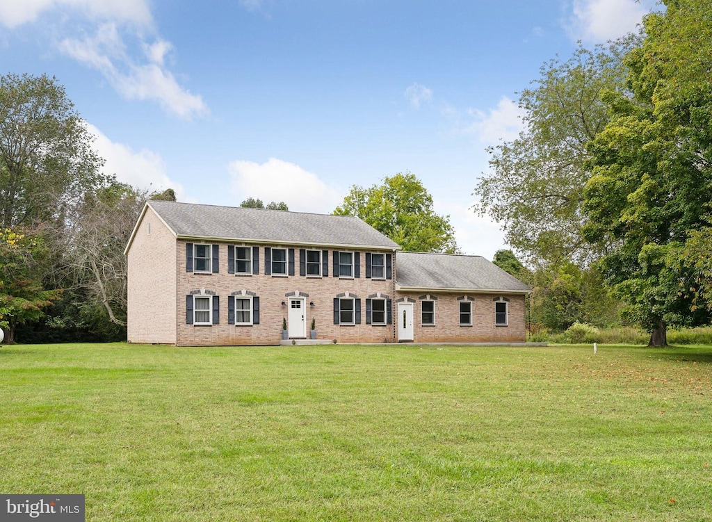 colonial house with a front yard