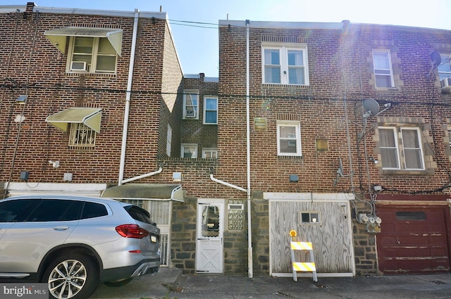 view of front of property with brick siding