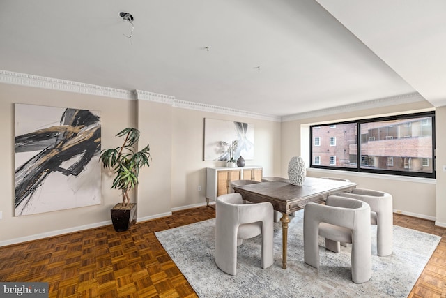 dining space featuring ornamental molding and dark parquet flooring