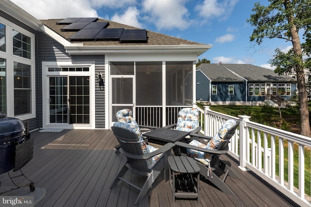 wooden terrace with a sunroom