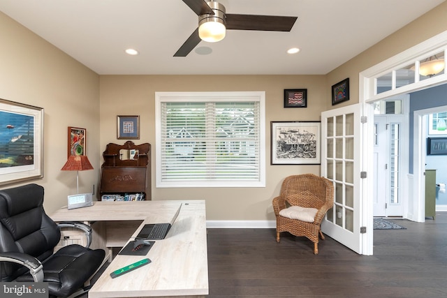 home office with ceiling fan and dark wood-type flooring