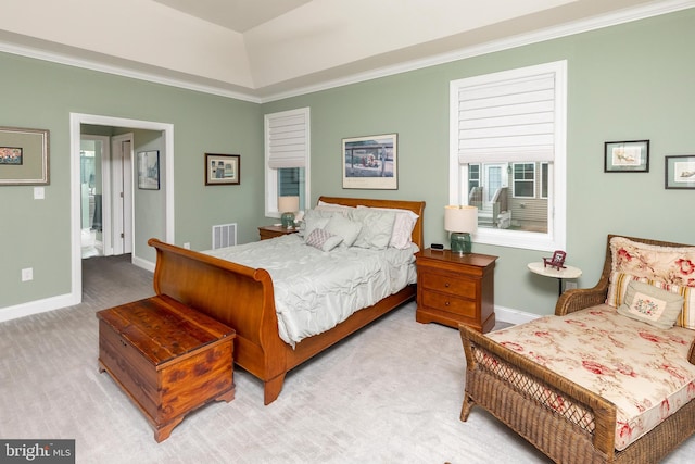 bedroom featuring light carpet and ornamental molding