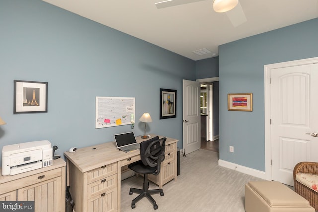 home office with light colored carpet