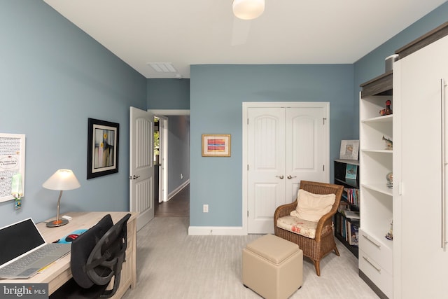 office area featuring light hardwood / wood-style floors and ceiling fan