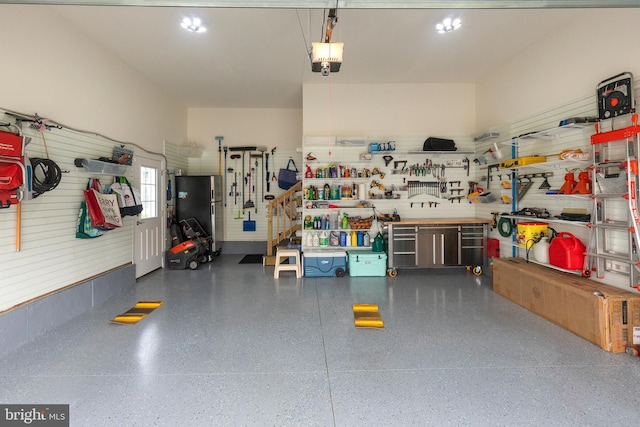 garage with a workshop area