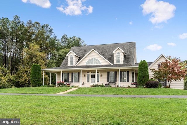 view of front of house with a front yard and a porch