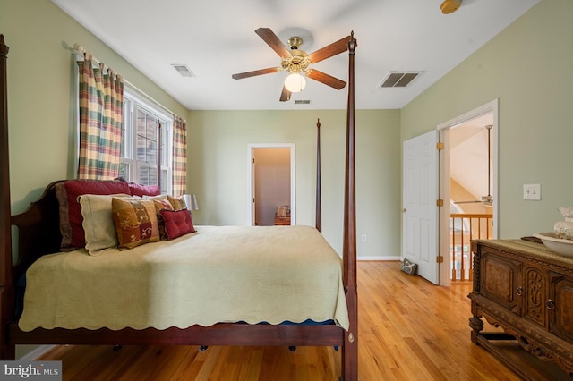 bedroom with light wood-type flooring and ceiling fan