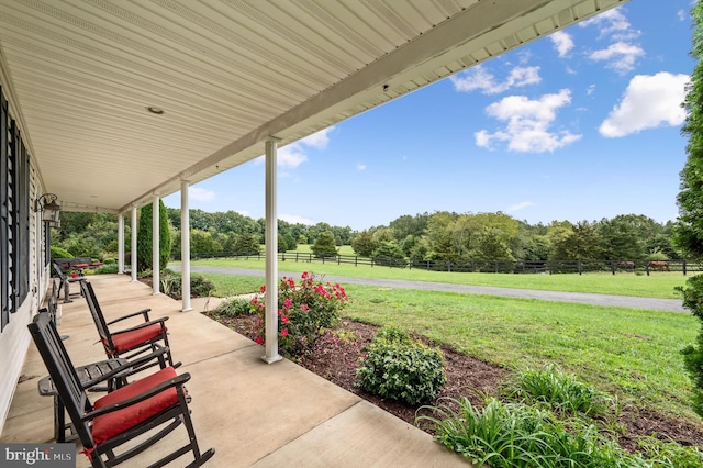 view of patio / terrace with a rural view