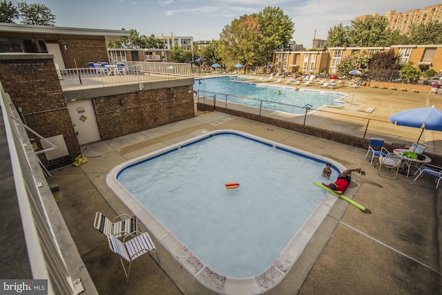 view of pool with a patio area