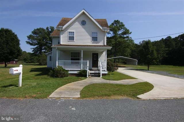 view of front facade featuring a front lawn and covered porch