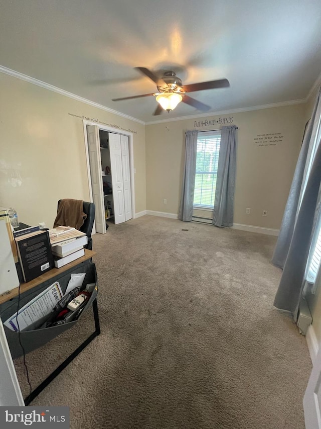 interior space featuring a closet, ceiling fan, and crown molding