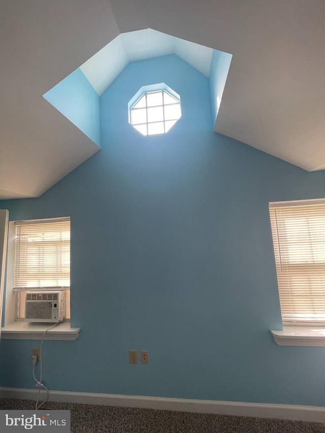 room details featuring cooling unit and carpet flooring