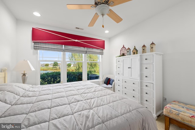 carpeted bedroom with ceiling fan