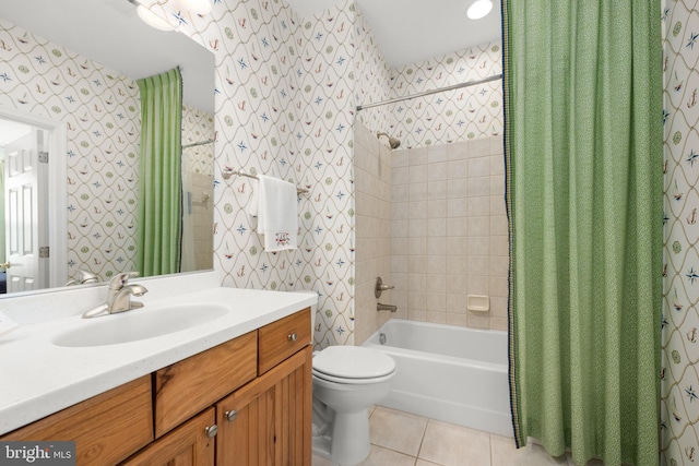 full bathroom featuring shower / bath combination with curtain, tile patterned floors, vanity, and toilet