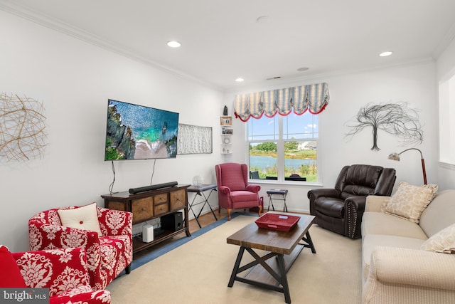 living room with ornamental molding and hardwood / wood-style flooring