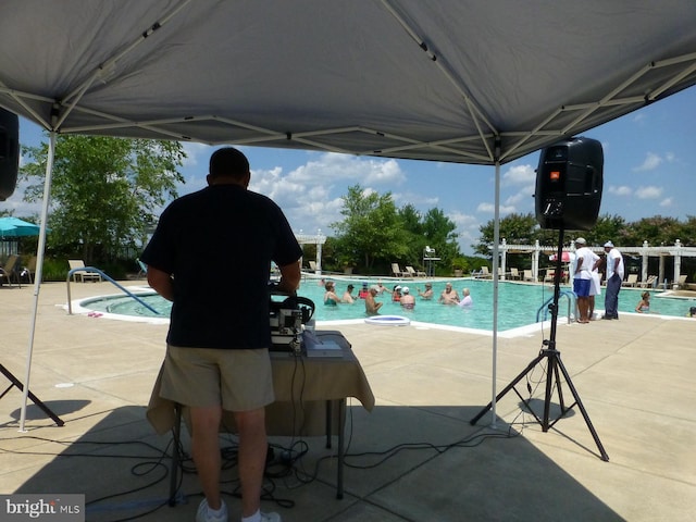 view of pool with a patio area