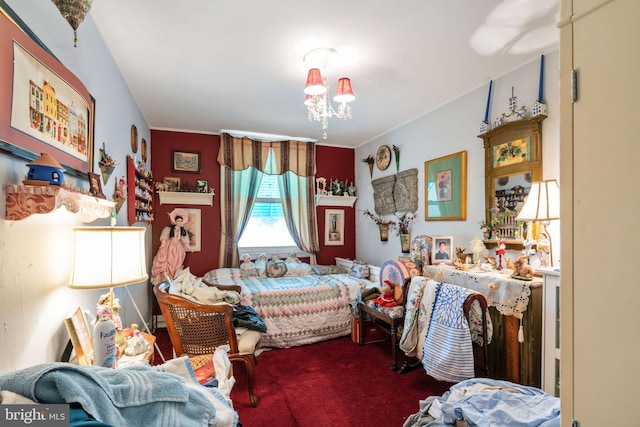 carpeted bedroom featuring an inviting chandelier