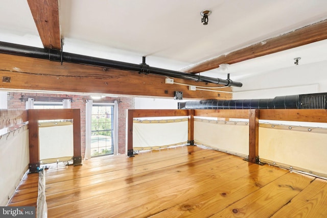 basement with wood-type flooring