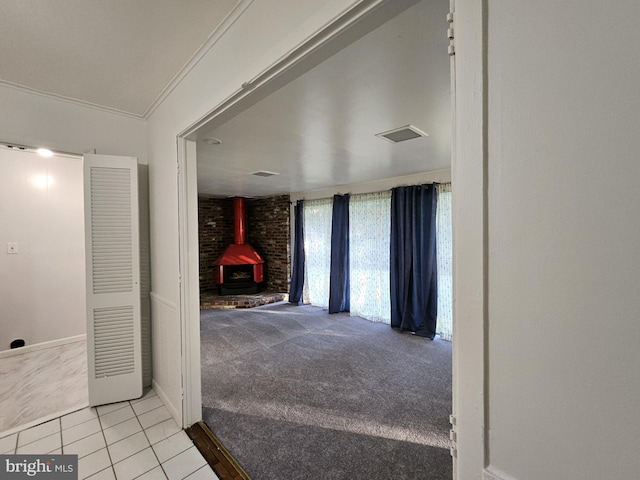 hall featuring crown molding and light colored carpet