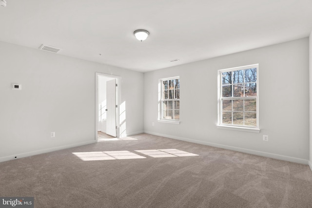 view of carpeted spare room