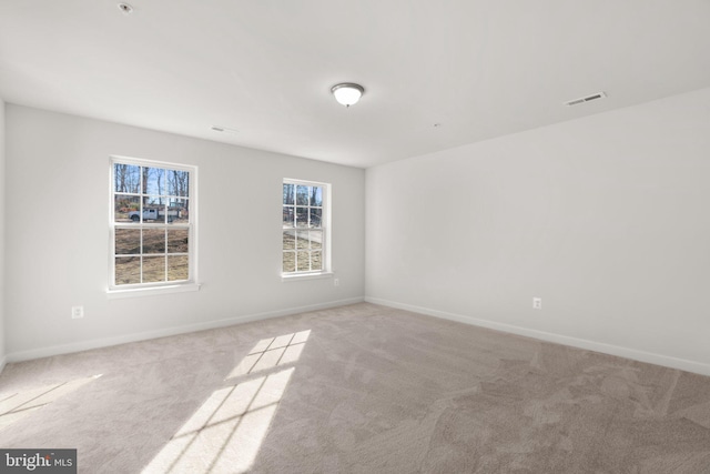 view of carpeted spare room