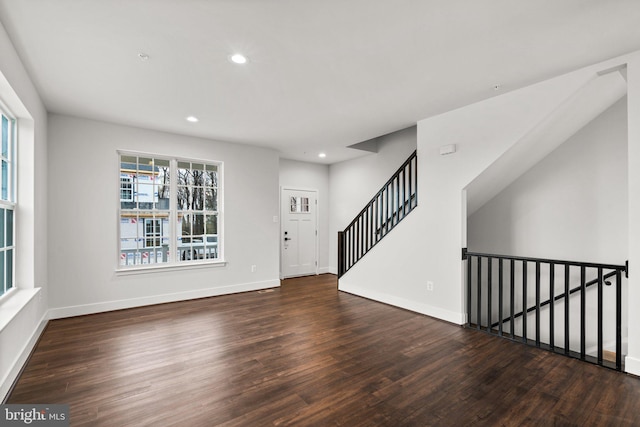 interior space with dark wood-type flooring